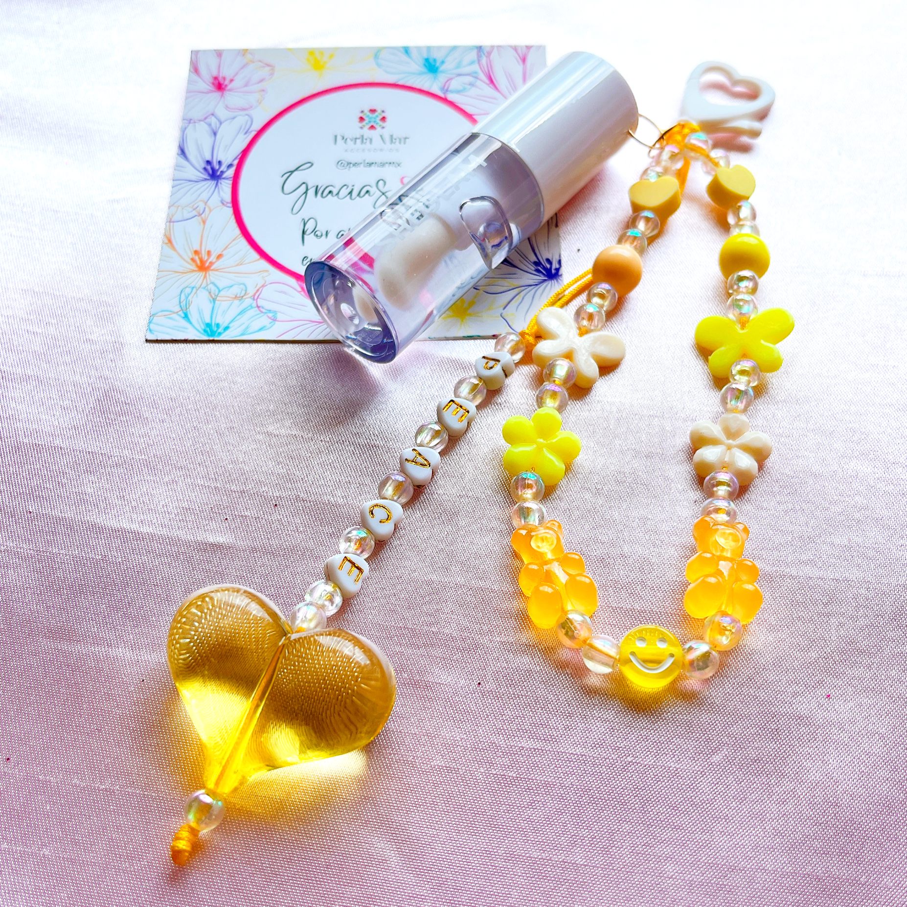 Lipgloss charm con straphone