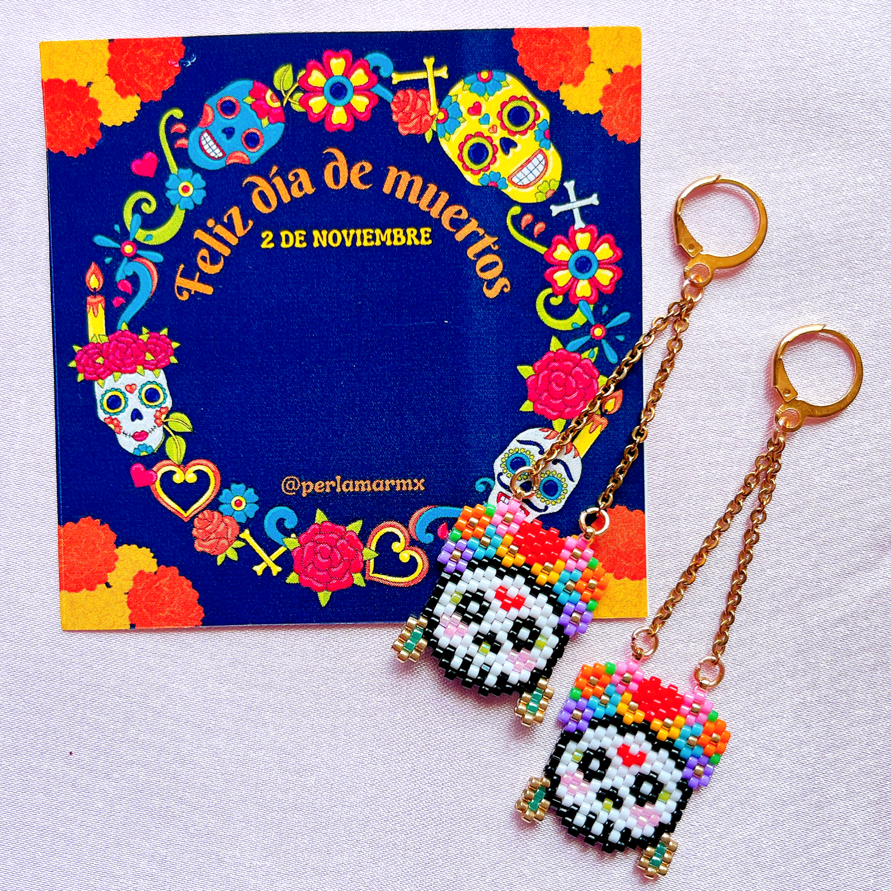 Aretes calaveras con cadena