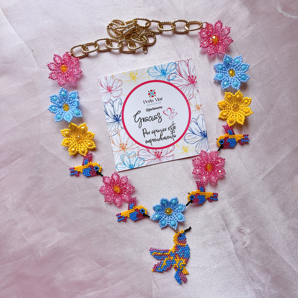 Collar flores y colibrí