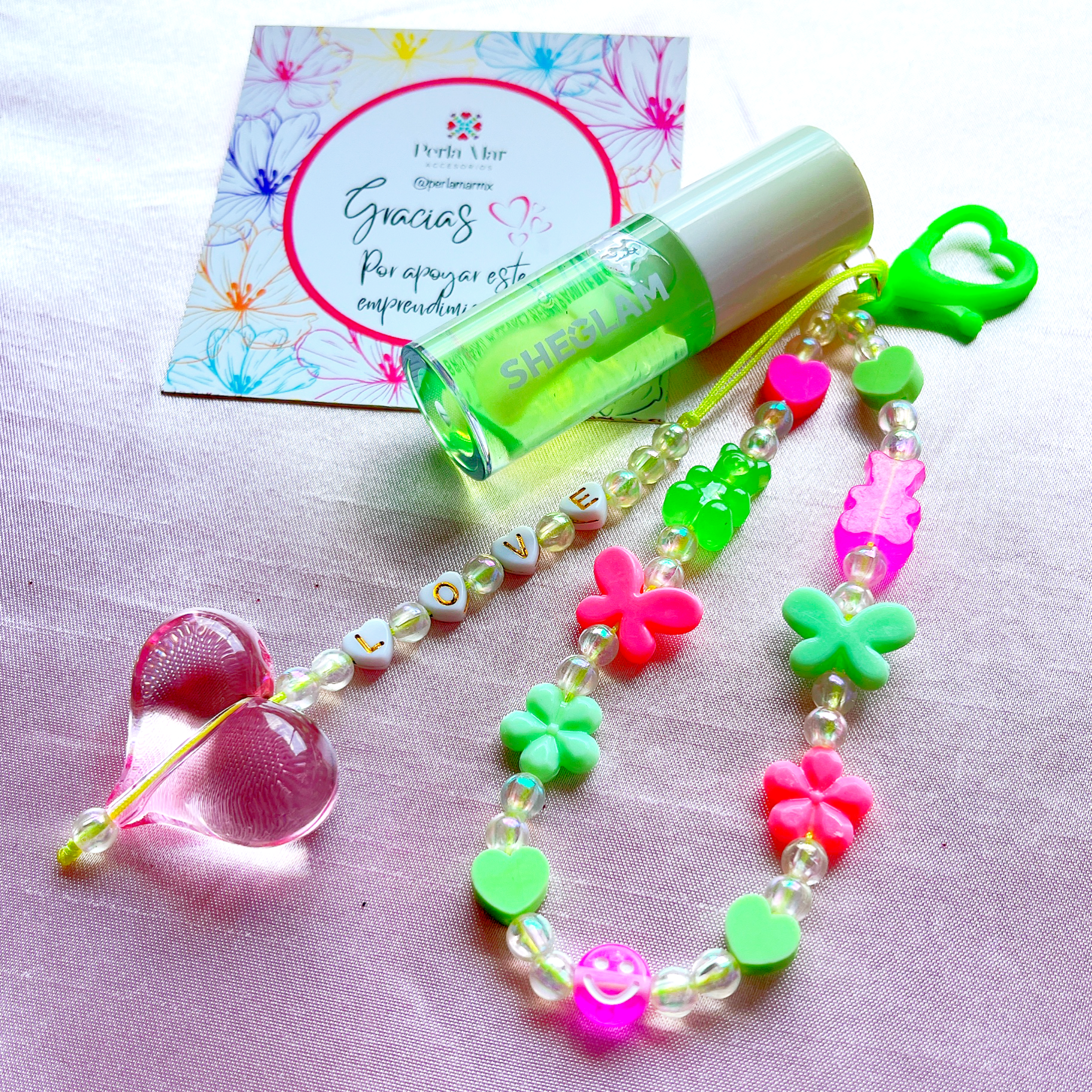 Lipgloss charm con straphone