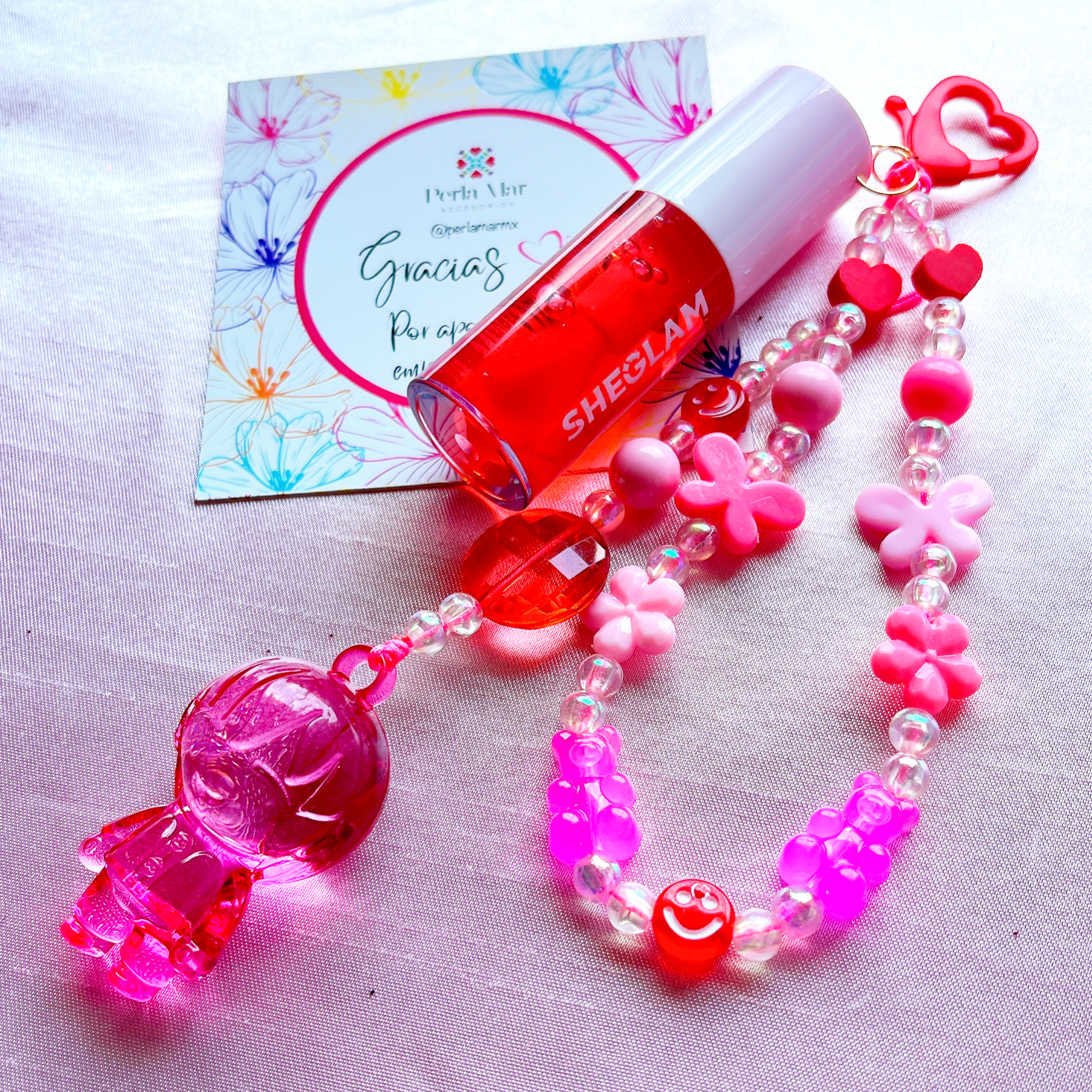 Lipgloss charm con straphone
